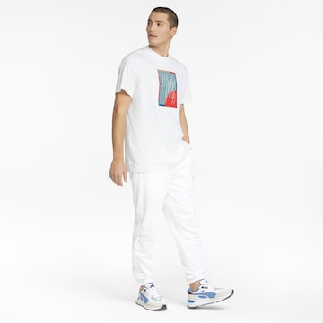 T-Shirt fonctionnel 'T7 Go For' PUMA en blanc