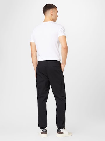 ABOUT YOU Regular Trousers 'Gerrit' in Black