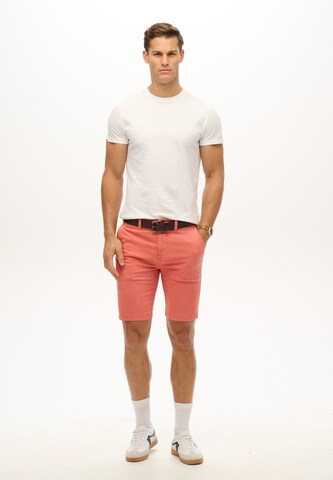 Superdry & Co Regular Chino trousers 'Vintage International' in Pink