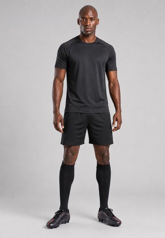 UMBRO Buty piłkarskie 'Tocco VI' w kolorze czarny
