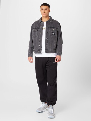 Calvin Klein Jeans Дънки Tapered Leg Панталон в черно