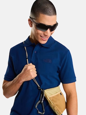 THE NORTH FACE T-shirt 'THE NORTH FACE M ESS RG POLO TEE POLO' i blå