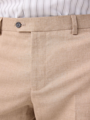 Next Tapered Suorat housut värissä harmaa