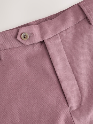 Slimfit Pantaloni con piega frontale di Next in rosa