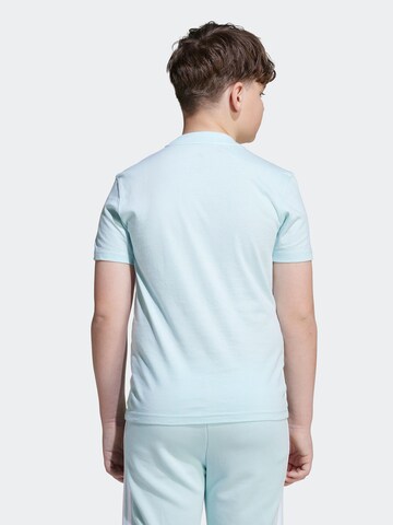 ADIDAS SPORTSWEAR - Camisa funcionais em azul