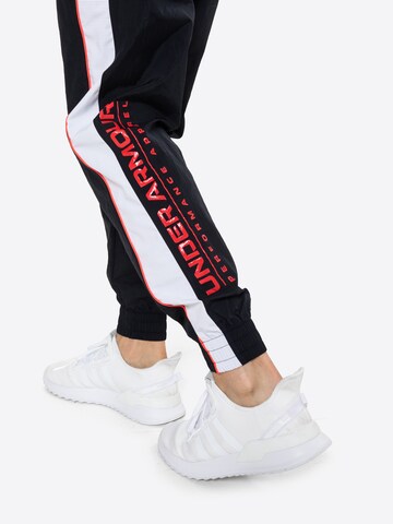 UNDER ARMOUR Tapered Sportbroek in Zwart