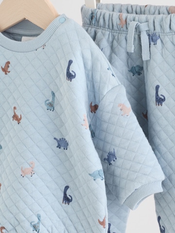 Set Next en bleu