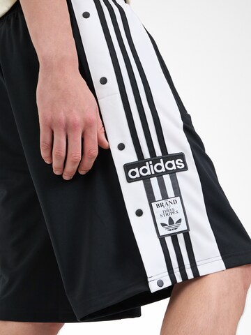 ADIDAS ORIGINALS Loosefit Παντελόνι 'MEGABREAK' σε μαύρο