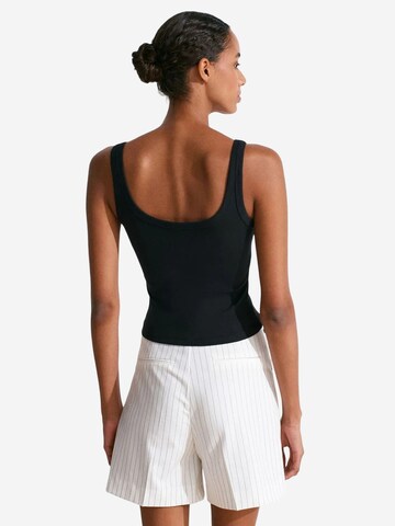 Top 'Blusen' di Dilvin in nero