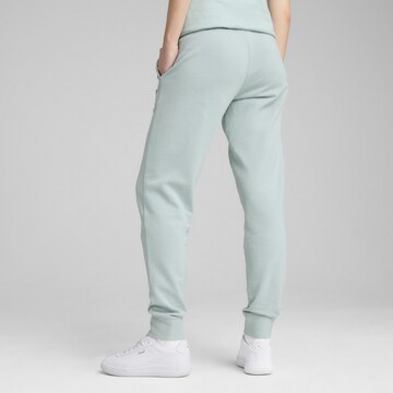 PUMA Tapered Sportbroek 'Ess Elevated' in Groen
