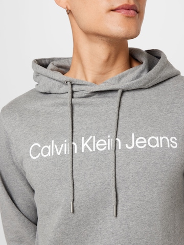 Calvin Klein Jeans Mikina – šedá