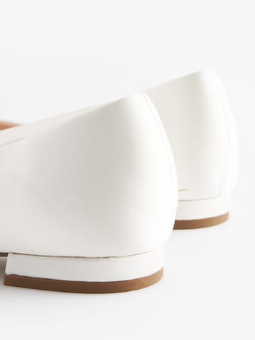 Next Slipper in Weiß