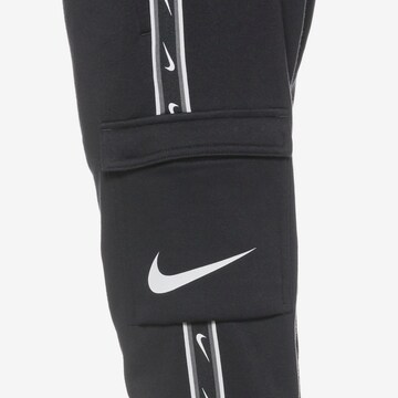 Nike Sportswear Дънки Tapered Leg Панталон в черно