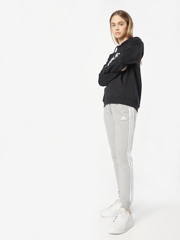 ADIDAS SPORTSWEAR Tapered Urheiluhousut 'Essentials' värissä harmaa