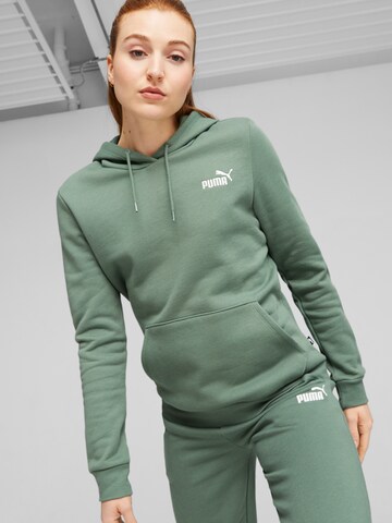PUMA Bluzka sportowa 'Essential' w kolorze zielony: przód