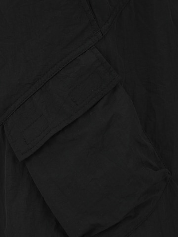 WEEKDAY Loosefit Byxa i svart