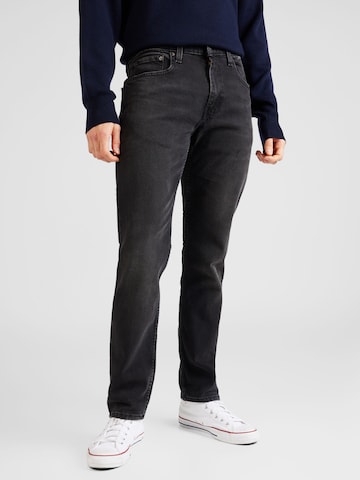 LEVI'S ® Tapered Jeans '502' in Black: front