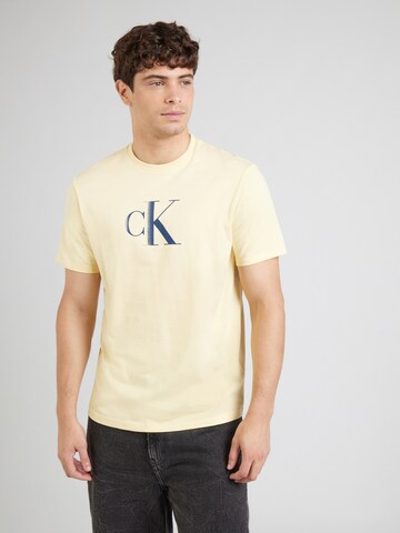 Calvin Klein Jeans Тениска в жълто: отпред