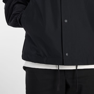 new balance Between-Season Jacket in Black