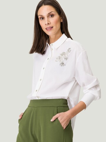 Camicia da donna di zero in bianco: frontale