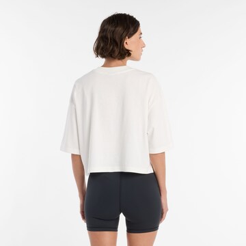 Maglia extra large di new balance in bianco