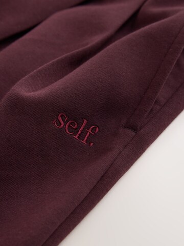 self. Tapered Hose in Rot