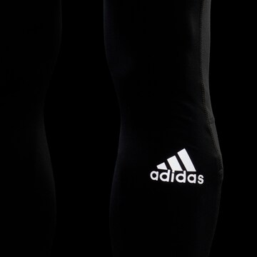 ADIDAS SPORTSWEAR Skinny Urheiluhousut värissä musta