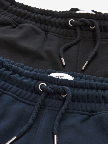 Tapered Pantaloni di Next in blu