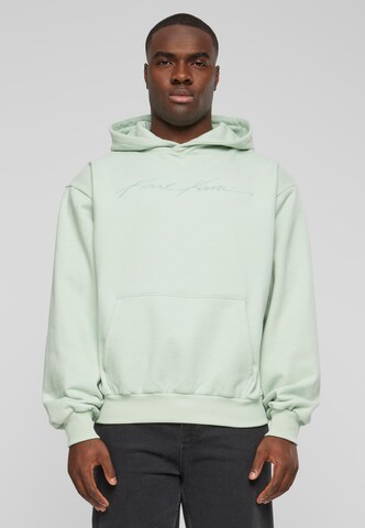 Sweat-shirt Karl Kani en vert : devant