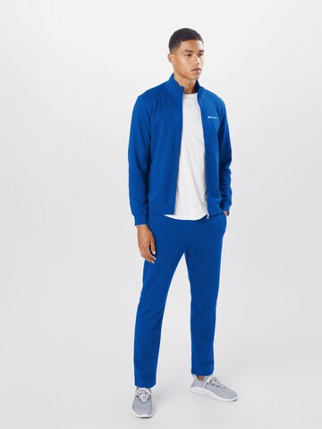 Champion Authentic Athletic Apparel Trainingspak in Blauw