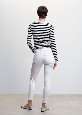 Skinny Jeans 'Isa' de la MANGO pe alb