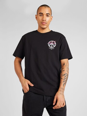 T-Shirt Tommy Jeans en noir : devant