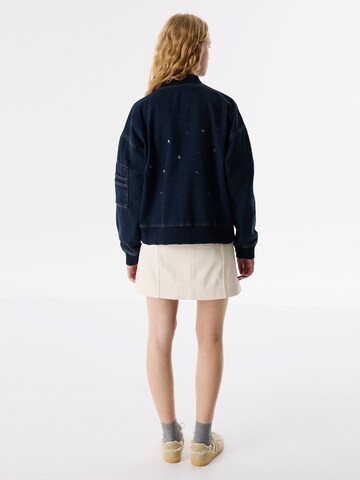Twist Between-season jacket in Blue