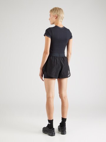NIKE - Slimfit Pantalón deportivo en negro