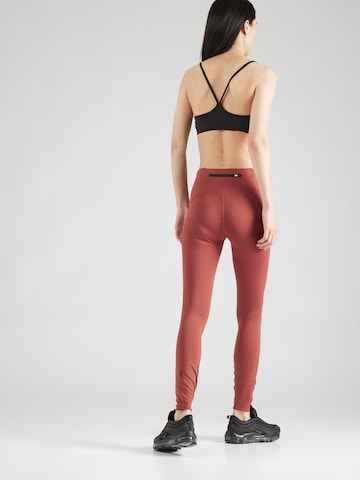 Skinny Pantaloni sportivi di On in rosso