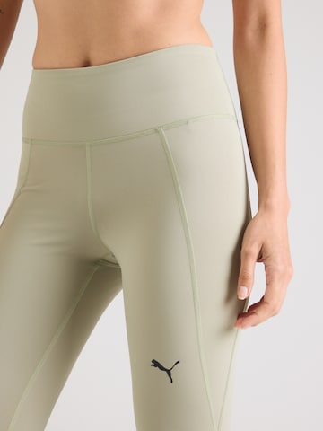 PUMA Skinny Sportbroek 'Essential' in Groen