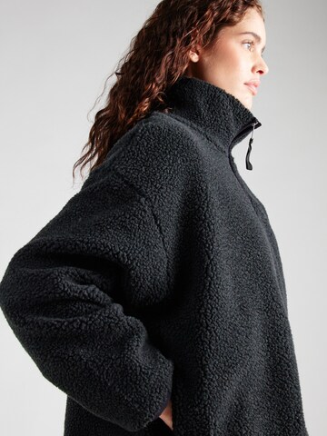 Giacca di pile di Monki in nero
