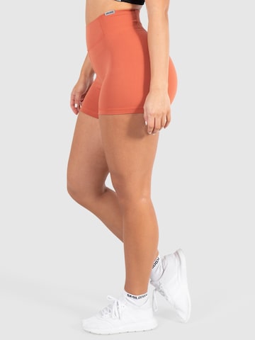 Skinny Pantalon de sport 'Advance Pro' Smilodox en orange
