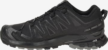 SALOMON Sportschuh in Schwarz: Vorderseite