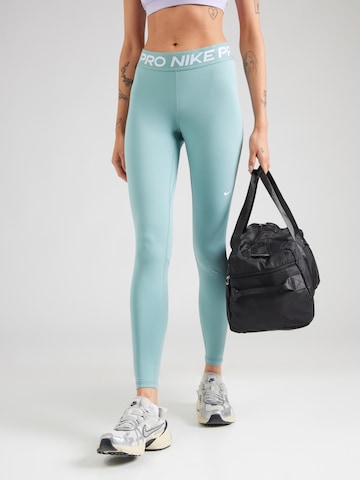 Skinny Pantalon de sport 'Pro' NIKE en vert : devant