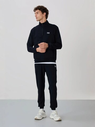 Tommy Life Tracksuit 'Aktive Sets' in Black