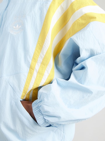 ADIDAS ORIGINALS Átmeneti dzseki 'Santiago' - kék