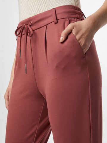 Slimfit Pantaloni cutați 'Poptrash' de la ONLY pe roșu