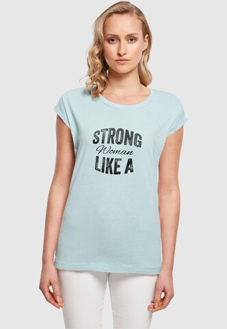 Merchcode Shirt 'WD - Strong Like A Woman' in Blauw: voorkant
