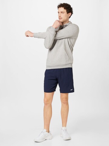 Reebok - Sweatshirt de desporto em cinzento