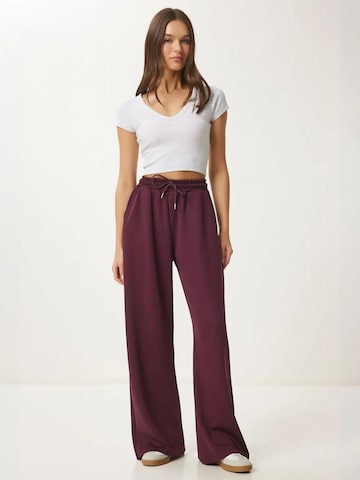 Wide leg Pantaloni di Happiness İstanbul in rosso