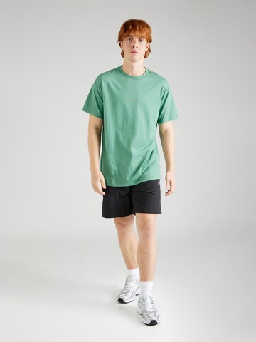 QUIKSILVER Performance shirt 'PEACE PHASE' in Green