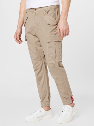 ALPHA INDUSTRIES Tapered Cargo trousers 'Airman' in Beige: front