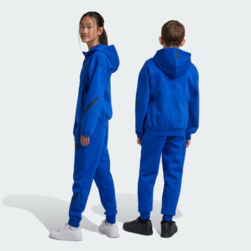 ADIDAS SPORTSWEAR Tapered Sports trousers in Blue