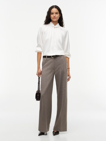 TOMMY HILFIGER - Blusa en blanco